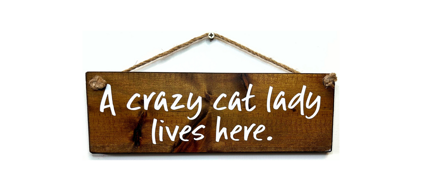 A Crazy Cat Lady Lives Here