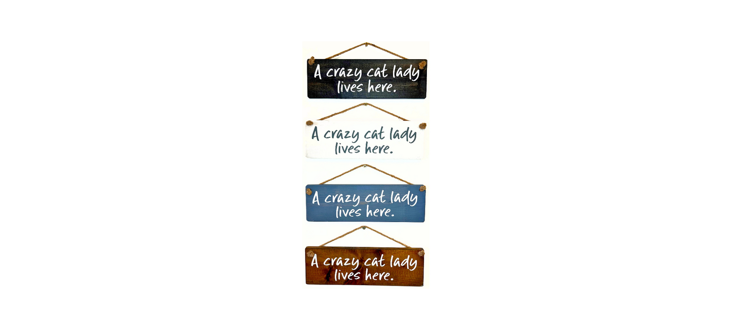 A Crazy Cat Lady Lives Here