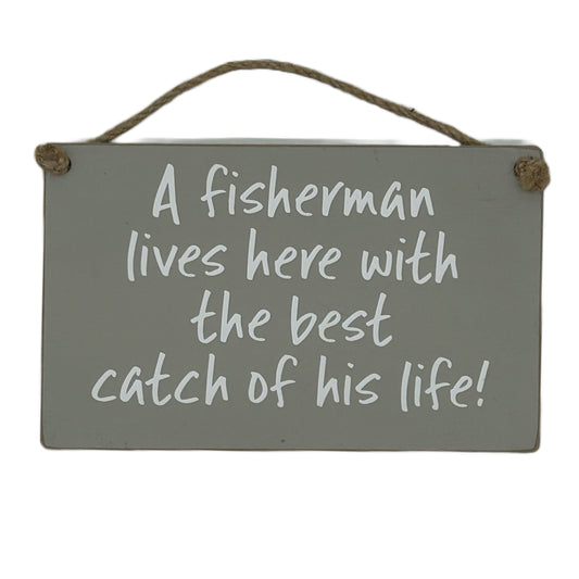 A Fisherman lives here with the catch of his life!
