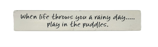 When life throws you a rainy day… play in the puddles.