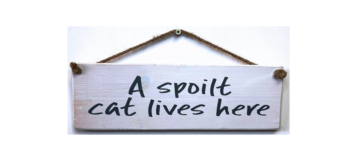 A Spoilt Cat Lives Here